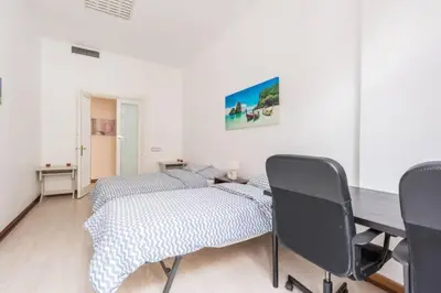 Cama o camas de una habitación en M&F Apartaments Gran Via