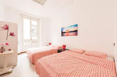 Cama o camas de una habitación en M&F Apartaments Gran Via