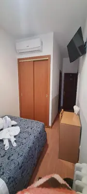 Cama o camas de una habitación en Hostal Salomé