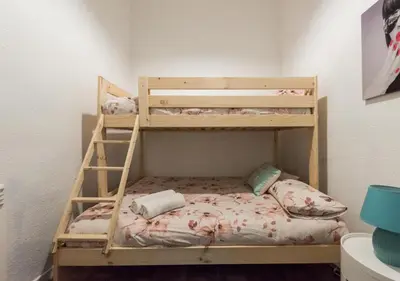 Cama o camas de una habitación en M&F Apartaments Chueca