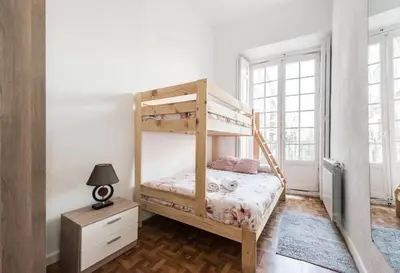 Cama o camas de una habitación en M&F Apartaments Chueca