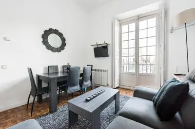 Una televisión o centro de entretenimiento en M&F Apartaments Chueca