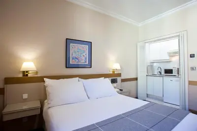 Cama o camas de una habitación en Espahotel Gran Vía
