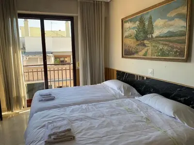 Cama o camas de una habitación en Apartamentos Torr en Madrid - Chamartín