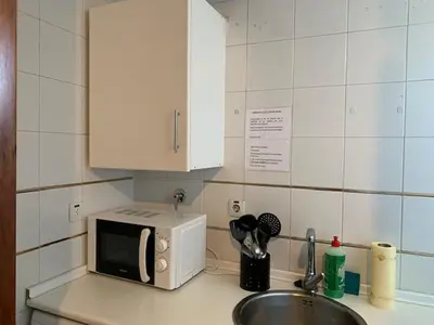 Una cocina o zona de cocina en Apartamentos Torr en Madrid - Chamartín