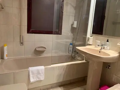 Un baño de Apartamentos Torr en Madrid - Chamartín
