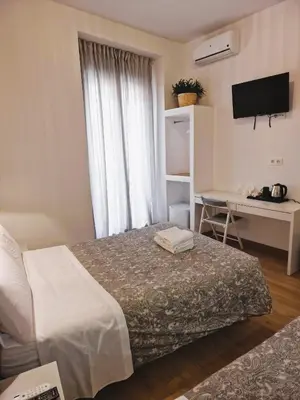 Cama o camas de una habitación en Hostal Comercial