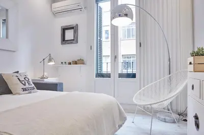 Cama o camas de una habitación en LEEWAYS LOFT I in HORTALEZA