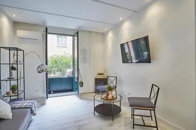 Una televisión o centro de entretenimiento en LEEWAYS LOFT II in HORTALEZA
