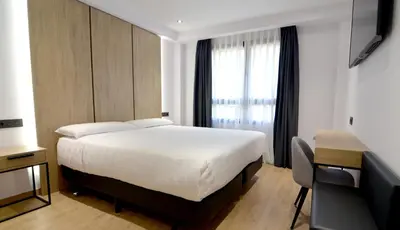Cama o camas de una habitación en UVE Marcenado