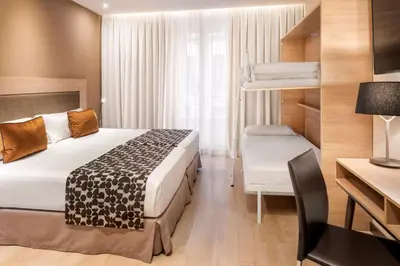 Cama o camas de una habitación en Catalonia Plaza Mayor