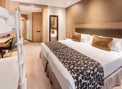 Cama o camas de una habitación en Catalonia Plaza Mayor