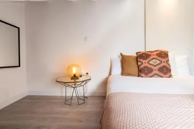 Cama o camas de una habitación en Fuencarral II - Apartamento tipo buhardilla en el centro de Madrid