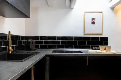 Una cocina o zona de cocina en Fuencarral II - Apartamento tipo buhardilla en el centro de Madrid