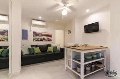 Una televisión o centro de entretenimiento en Santa Isabel - Apartamento de 1 dormitorio