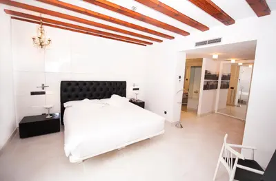 Cama o camas de una habitación en Posada del León de Oro Boutique Hotel