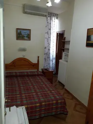 Cama o camas de una habitación en Hostal Fuentesol