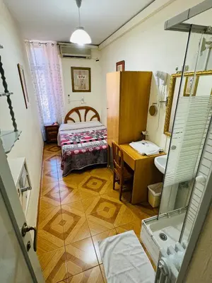 Cama o camas de una habitación en Hostal Fuentesol