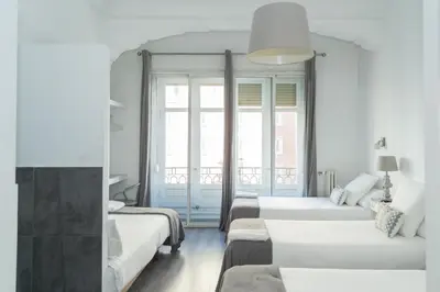 Cama o camas de una habitación en Gran Via 63 Rooms