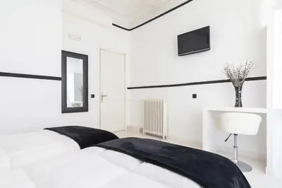 Cama o camas de una habitación en Gran Via 63 Rooms