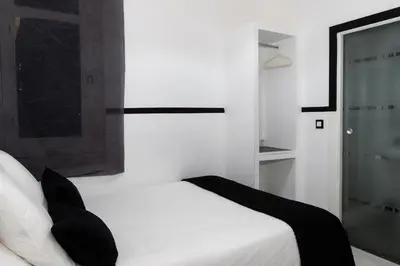 Cama o camas de una habitación en Gran Via 63 Rooms