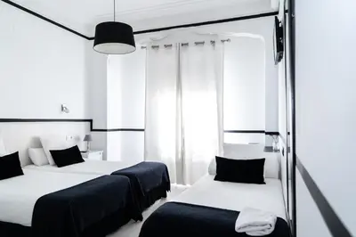 Cama o camas de una habitación en Gran Via 63 Rooms