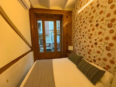 Cama o camas de una habitación en El Jardín del Ángel Olivo