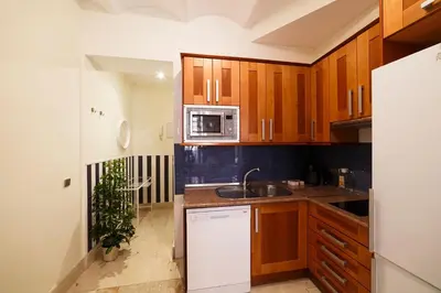 Una cocina o zona de cocina en El Jardín del Ángel Olivo
