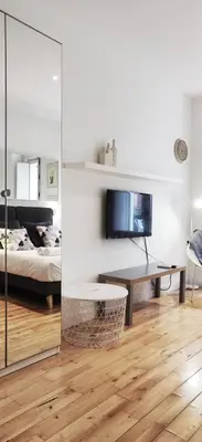 Una televisión o centro de entretenimiento en LEEWAYS LOFT in FUENCARRAL