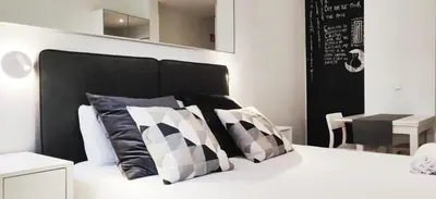 Cama o camas de una habitación en LEEWAYS LOFT in FUENCARRAL