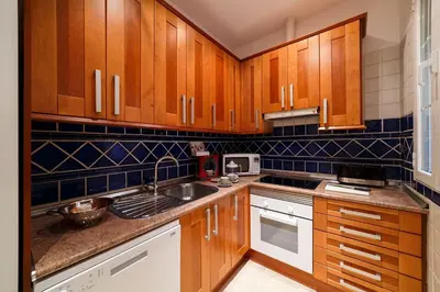 Una cocina o zona de cocina en El Jardín del Ángel Sauce