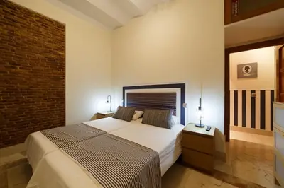 Cama o camas de una habitación en El Jardín del Ángel Sauce