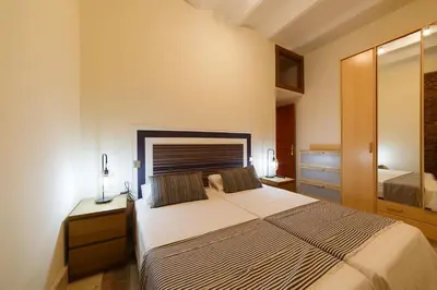 Cama o camas de una habitación en El Jardín del Ángel Sauce
