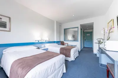 Cama o camas de una habitación en Espahotel Plaza de España