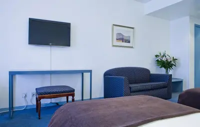 Una televisión o centro de entretenimiento en Espahotel Plaza de España