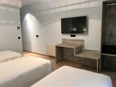 Cama o camas de una habitación en Hostal Anton Martin