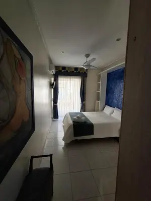 Cama o camas de una habitación en Hostal Villamañez