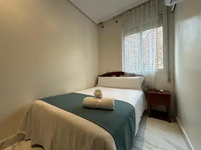 Cama o camas de una habitación en Hostal Villamañez