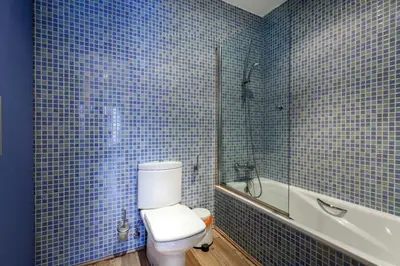 Un baño de En Palacio Casa Entera con Dos Suites