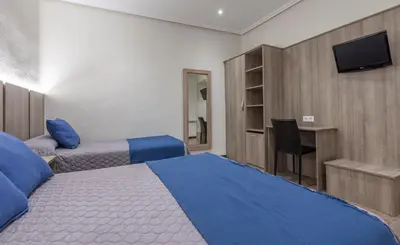 Una televisión o centro de entretenimiento en Hostal María Luisa