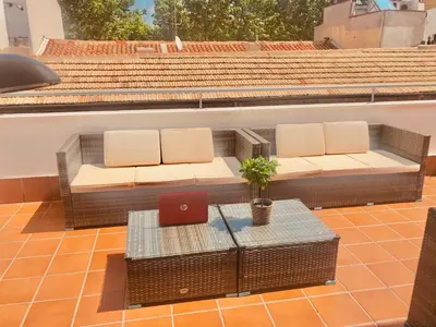 Zona de estar de ATICO & TERRAZA a 6 minutos en metro de ATOCHA estacion central