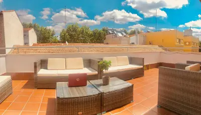 Zona de estar de ATICO & TERRAZA a 6 minutos en metro de ATOCHA estacion central