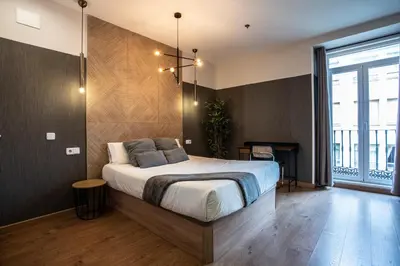 Cama o camas de una habitación en Suites You Zinc