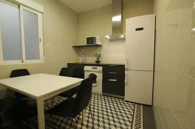 Una cocina o zona de cocina en Suites You Zinc