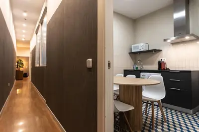 Una cocina o zona de cocina en Suites You Zinc