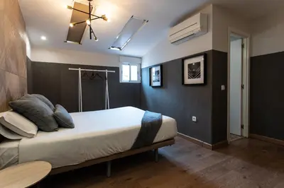 Cama o camas de una habitación en Suites You Zinc