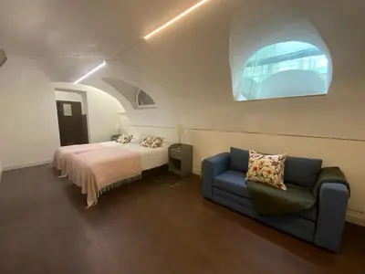 Cama o camas de una habitación en El Jardín del Ángel Camelia
