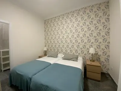 Cama o camas de una habitación en El Jardín del Ángel Camelia