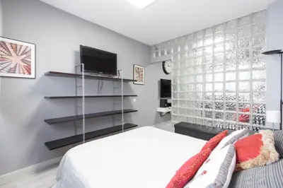Una televisión o centro de entretenimiento en Chueca Apartment