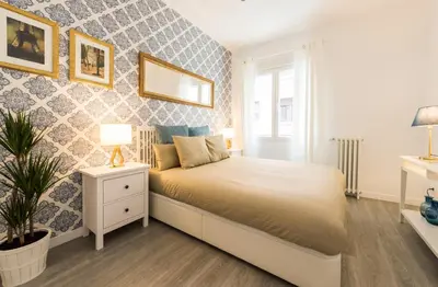 Cama o camas de una habitación en Apartamento en Chamberí
